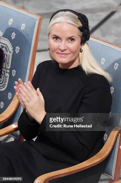 Crown Princess Mette-Marit attends the Nobel Peace Prize ceremony for laureate Iranian activist Narges Mohammadi at Oslo City Hall on December 10,...