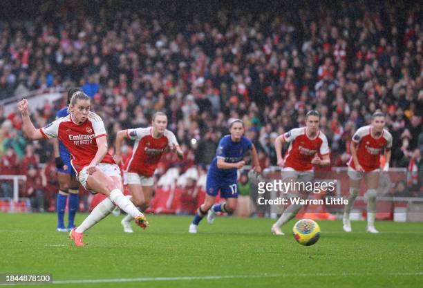 Alessia Russo of Arsenal scores their team's fourth goal from the penalty spot during the Barclays Women's Super League match between Arsenal FC and...