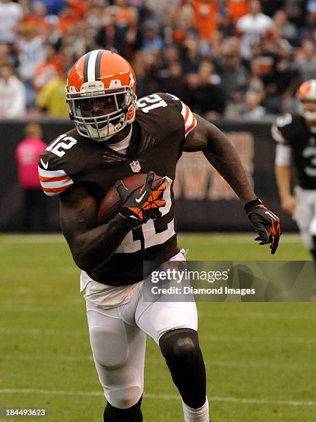 Wide receiver Josh Gordon of the Cleveland Browns carries the ball downfield during a game against the Detroit Lions on October 13, 2013 at...