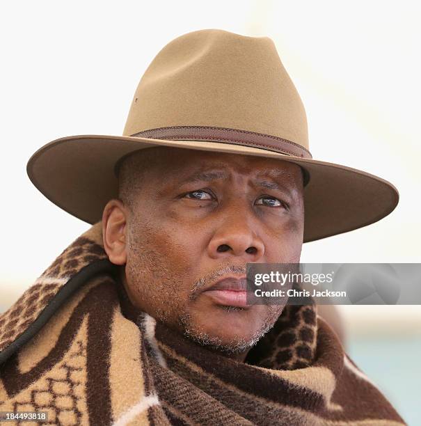 His Majesty King Letsie III of Lesotho looks on at the opening ceremony of the new Sentebale Mateanong Herd Boy School on October 14, 2013 in...