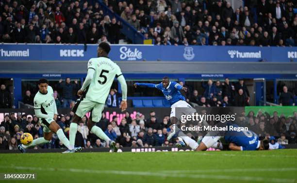 Abdoulaye Doucoure of Everton scores their team's first goal during the Premier League match between Everton FC and Chelsea FC at Goodison Park on...