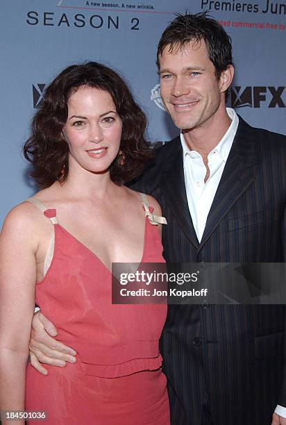 Joanna Going and Dylan Walsh during "Nip/Tuck" Season 2 Premiere - Arrivals at Paramount Pictures Theatre in Los Angeles, California, United States.