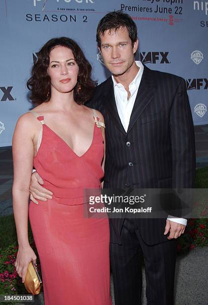 Joanna Going and Dylan Walsh during "Nip/Tuck" Season 2 Premiere - Arrivals at Paramount Pictures Theatre in Los Angeles, California, United States.