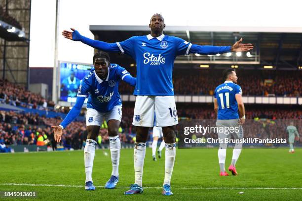 Abdoulaye Doucoure of Everton celebrates scoring the opening goal with team-mate Amadou Onana during the Premier League match between Everton FC and...