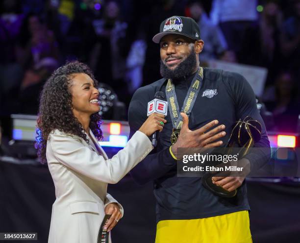 Malika Andrews interviews LeBron James of the Los Angeles Lakers after he won the MVP trophy following the team's 123-109 victory over the Indiana...