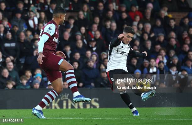 Harry Wilson of Fulham scores their team's fourth goal during the Premier League match between Fulham FC and West Ham United at Craven Cottage on...