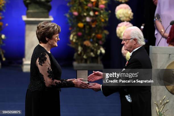 Katalin Karikó receives The Nobel Prize in Physiology or Medicine 2023 from King Carl XVI Gustaf of Sweden at the Nobel Prize Awards Ceremony 2023 at...