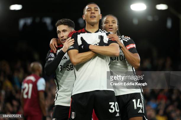 Carlos Vinicius of Fulham celebrates scoring their team's fifth goal during the Premier League match between Fulham FC and West Ham United at Craven...
