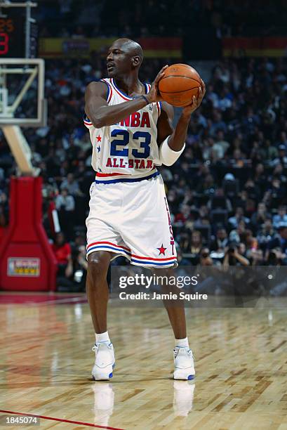 Michael Jordan of the Eastern Conference All-Stars looks to pass at the 2003 NBA All-Star Game on February 9, 2003 at Philips Arena in Atlanta,...