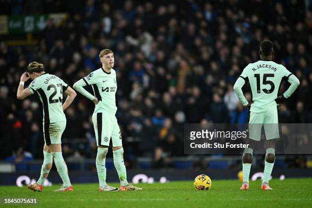 Cole Palmer of Chelsea looks dejected after Lewis Dobbin of Everton scores their team's second goal during the Premier League match between Everton...