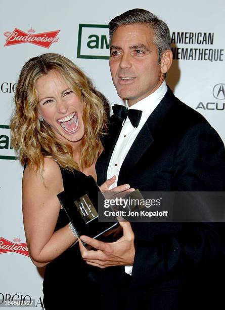 Julia Roberts and George Clooney during The 21st Annual American Cinematheque Award Honoring George Clooney - Press Room at Beverly Hilton Hotel in...