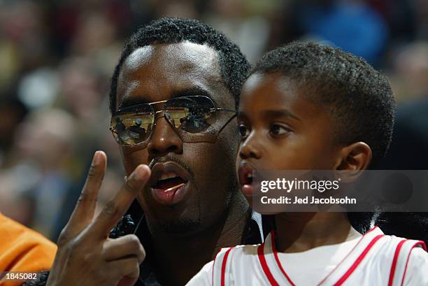 Rapper Sean 'P. Diddy' Combs and his son Justin watch the 2003 NBA All-Star Game on February 9, 2003 at Philips Arena in Atlanta, Georgia. NOTE TO...