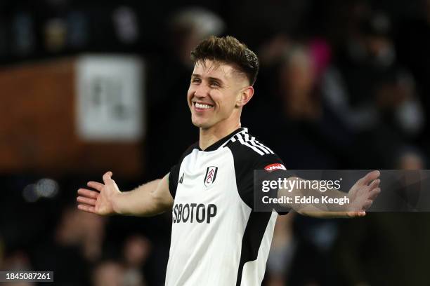 Tom Cairney of Fulham celebrates after the team's victory during the Premier League match between Fulham FC and West Ham United at Craven Cottage on...