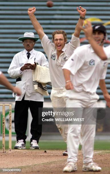 New Zealand spinner celebrates after taking the wicket of Australian batsman and becomes the youngest spin bowler at the age of 21 to take 100 Test...