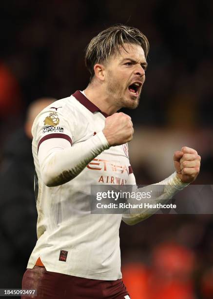 Jack Grealish of Manchester City celebrates after the team's victory during the Premier League match between Luton Town and Manchester City at...