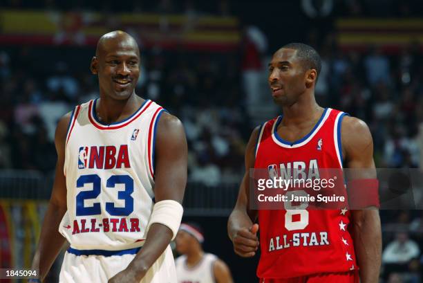 Michael Jordan of the Eastern Conference All-Stars talks with Kobe Bryant of the Western Conference All-Stars at the 2003 NBA All-Star Game on...