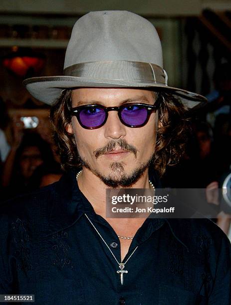 Johnny Depp during "Pirates of the Caribbean: Dead Man's Chest" Los Angeles Premiere - Arrivals at Disneyland/Main Street in Anaheim, California,...