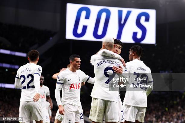 Richarlison of Tottenham Hotspur celebrates scoring their team's second goal with teammate Son Heung-Min during the Premier League match between...