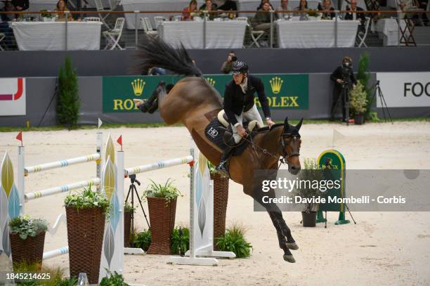 Richard Vogel, From Germany, riding United Touch S during Rolex Grand Prix One of the four legs of the Rolex Grand Slam of Show Jumping, comprising...