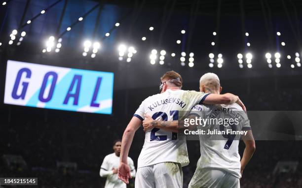 Richarlison of Tottenham Hotspur celebrates with teammate Dejan Kulusevski after scoring their team's second goal during the Premier League match...