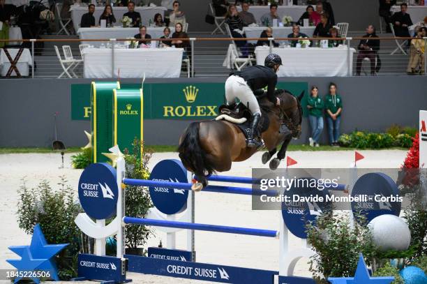 Richard Vogel, From Germany, riding United Touch S during Rolex Grand Prix One of the four legs of the Rolex Grand Slam of Show Jumping, comprising...