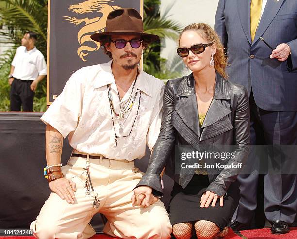 Johnny Depp and Vanessa Paradis during Johnny Depp Honored with a Hand and Footprint Ceremony at Grauman's Chinese Theatre at Grauman's Chinese...