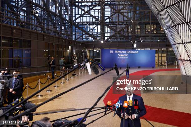 Chairman of the EU-Western Balkans summit and President of the European Council, Charles Michel speaks to the press as he arrives to attend the...