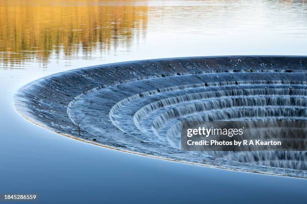 close up of the 'plug holes' at ladybower reservoir, derbyshire, england - water reservoir stock pictures, royalty-free photos & images