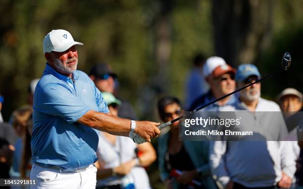 Darren Clarke of Northern Ireland playing for Team Europe plays his shot from the ninth tee on day three of the World Champions Cup at The Concession...