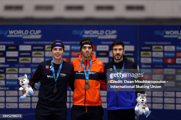 Hallgeir Engebraten of Norway poses with the silver medal, Patrick Roest of Netherlands with the gold medal and Davide Ghiotto of Italy with the...
