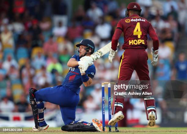 Liam Livingstone of England plays an attacking shot during the third CG United One Day International match between West Indies and England at...
