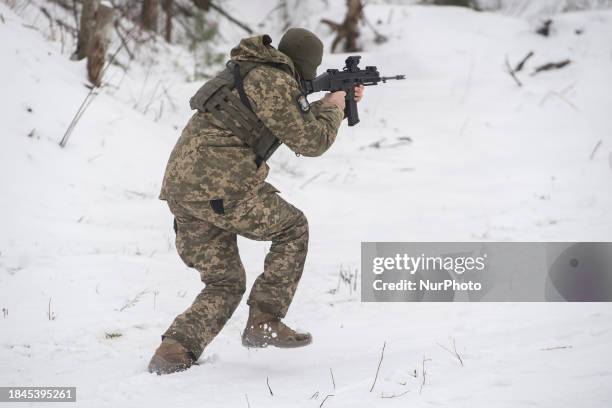 Member of the Siberian Battalion of the International Legion of the Armed Forces of Ukraine is participating in military exercises at a training...