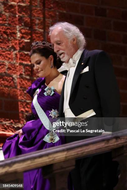 Crown Princess Victoria of Sweden and Pierre Agostini attend the Nobel Prize Banquet 2023 at Stockholm City Hall on December 10, 2023 in Stockholm,...