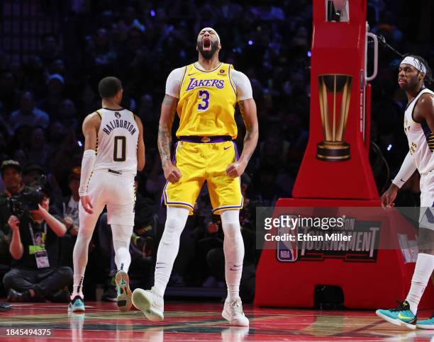 Anthony Davis of the Los Angeles Lakers celebrates a basket against the Indiana Pacers in the fourth quarter of the championship game of the...