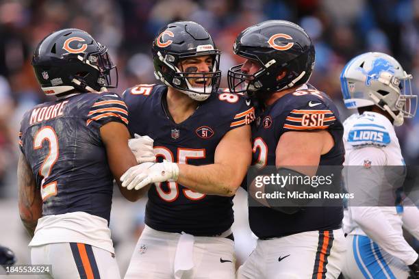 Cole Kmet of the Chicago Bears reacts after making a catch during the third quarter in the game against the Detroit Lions at Soldier Field on...