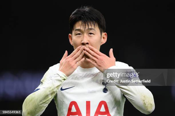 Son Heung-Min of Tottenham Hotspur celebrates scoring their team's fourth goal from the penalty spot during the Premier League match between...