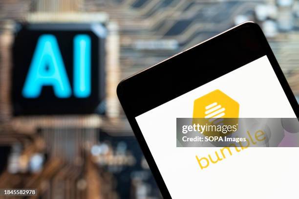 In this photo illustration, the location-based social and dating application Bumble logo seen displayed on a smartphone with an Artificial...