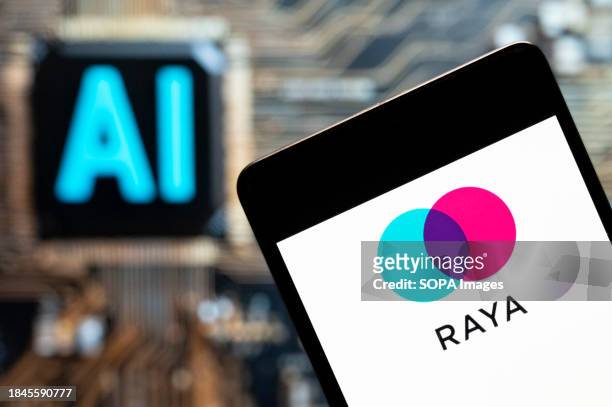 In this photo illustration, the social media membership-based community platform Raya logo seen displayed on a smartphone with an Artificial...