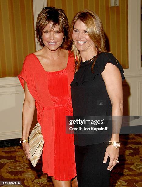 Actress Lisa Rinna and actress Lori Loughlin arrive at Saks Fifth Avenue's 20th Annual Spring Luncheon at the Beverly Wilshire Hotel on April 9, 2008...