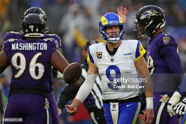 Matthew Stafford of the Los Angeles Rams reacts after being sacked during the third quarter in the game against Baltimore Ravens at M&T Bank Stadium...
