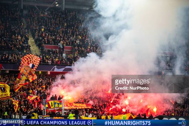 Supporters of Racing Club de Lens are cheering during the Champions League match between Racing Club de Lens and Sevilla Futbol Club at Stade...