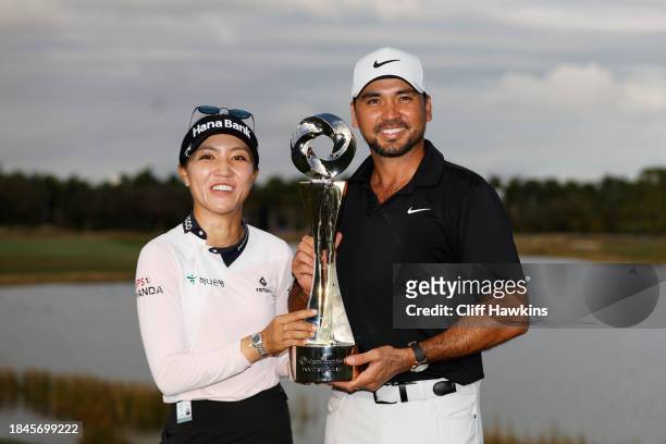 Lydia Ko of New Zealand and Jason Day of Australia celebrate with the trophy after winning during the final round of the Grant Thornton Invitational...
