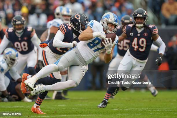 Tight end Sam LaPorta of the Detroit Lions catches a pass during the first half of an NFL football game against the Chicago Bears at Soldier Field on...