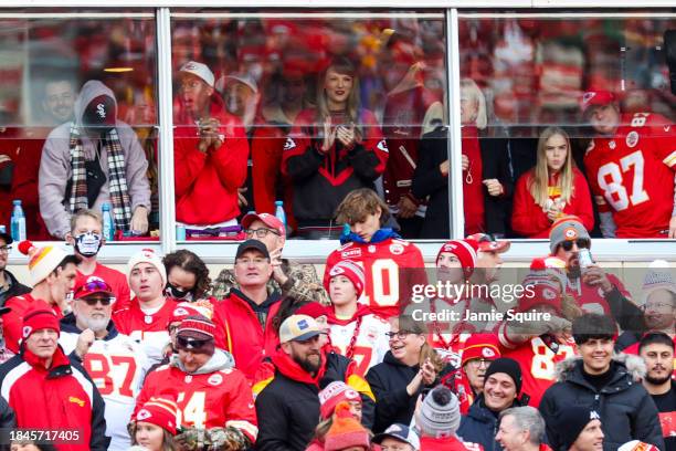 Taylor Swift reacts during the game between the Buffalo Bills and the Kansas City Chiefs at GEHA Field at Arrowhead Stadium on December 10, 2023 in...