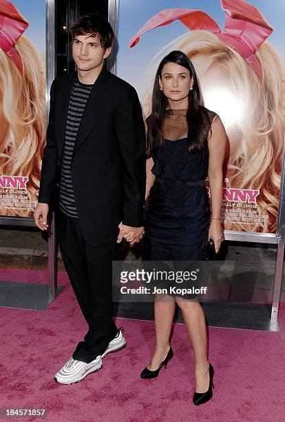 Actor Ashton Kutcher and wife actress Demi Moore arrive at the Los Angeles premiere of "The House Bunny" at the Mann Village Theatre on August 20,...