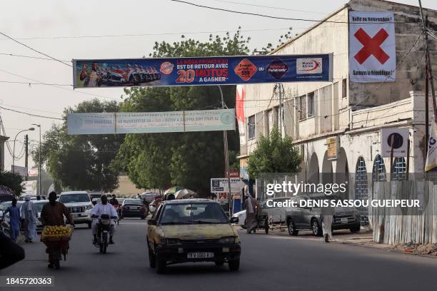 General view of a poster in a street that says "Halt the Referendum", in N'Djamena on December 13, 2023. Chadians vote on December 17, 2023 on a new...