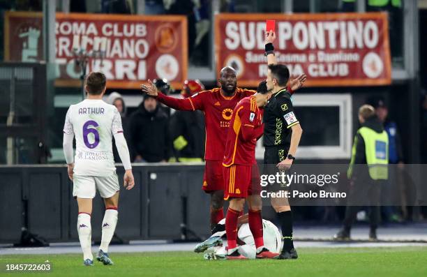 Romelu Lukaku of AS Roma is shown a red card by Referee Antonio Rapuano during the Serie A TIM match between AS Roma and ACF Fiorentina at Stadio...