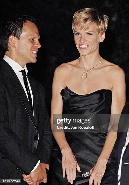 Actress Hilary Swank and talent agent John Campisi arrive at The Trump International Hotel & Tower Dubai on August 23, 2008 in Los Angeles,...