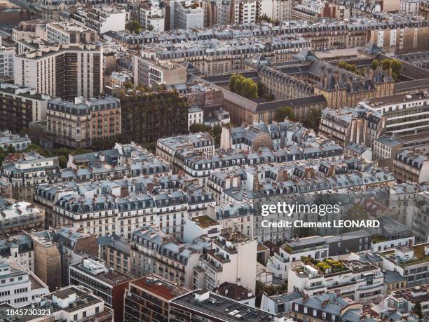 group of apartments and residential buildings in the haussmannian (haussmannien) style seen from above, paris, ile-de-france (ile de france), central france. - tour montparnasse stock pictures, royalty-free photos & images