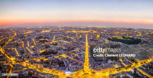 cityscape of paris seen from above at night with many famous monuments illuminated, paris, ile-de-france (ile de france), central france. - tour montparnasse stock pictures, royalty-free photos & images